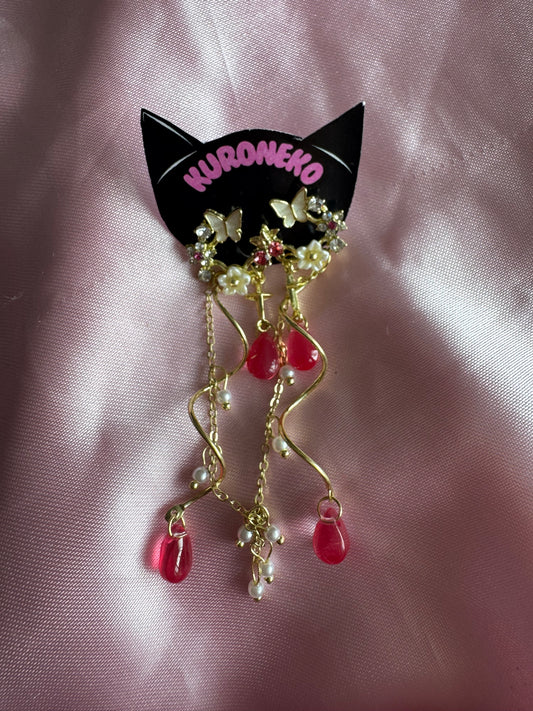 ARETES DE FLORES DORADO